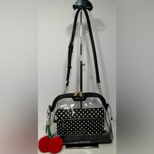 Nanette Lapore Clear Stadium Crossbody Bag with makeup bag.